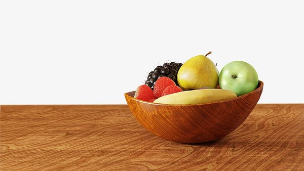 A wooden bowl with fresh fruit on a light table